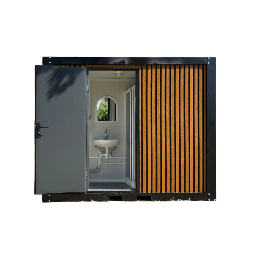 Interior front view of a portable bathroom unit with door open.