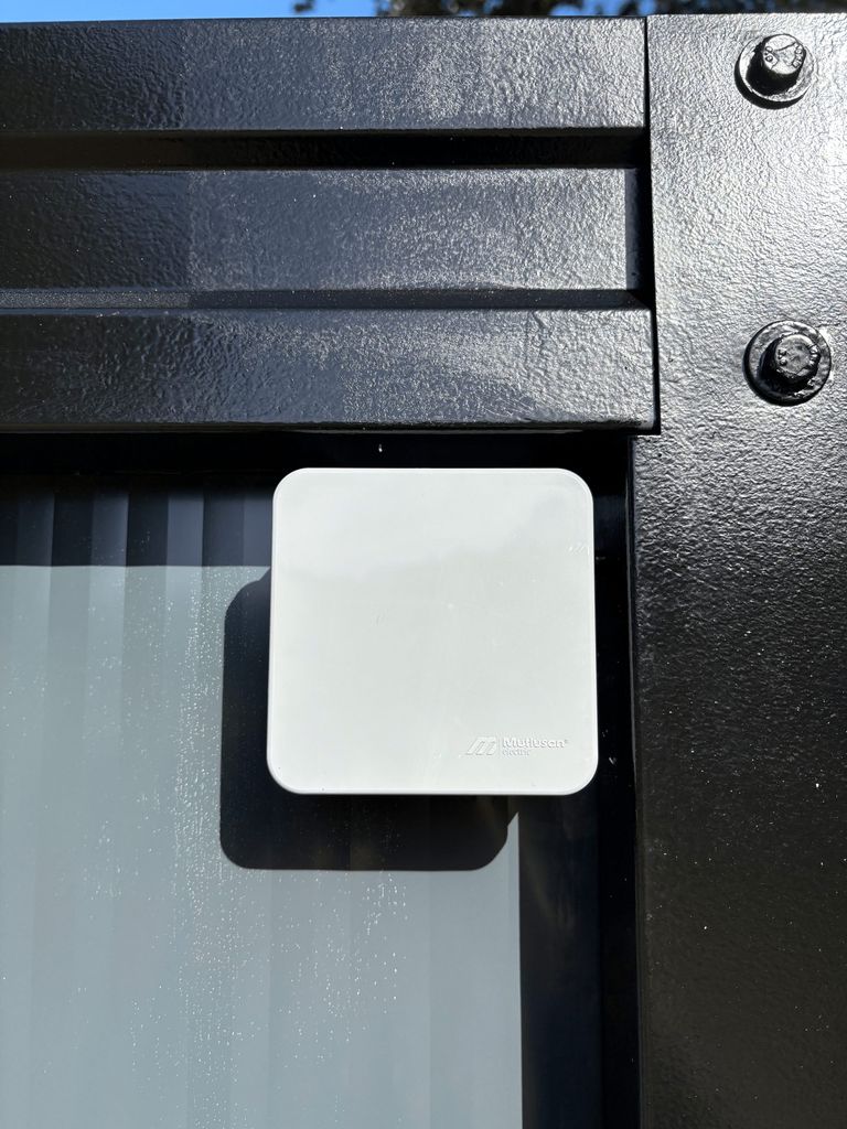 Exterior fuse box of a portable toilet unit for camping.