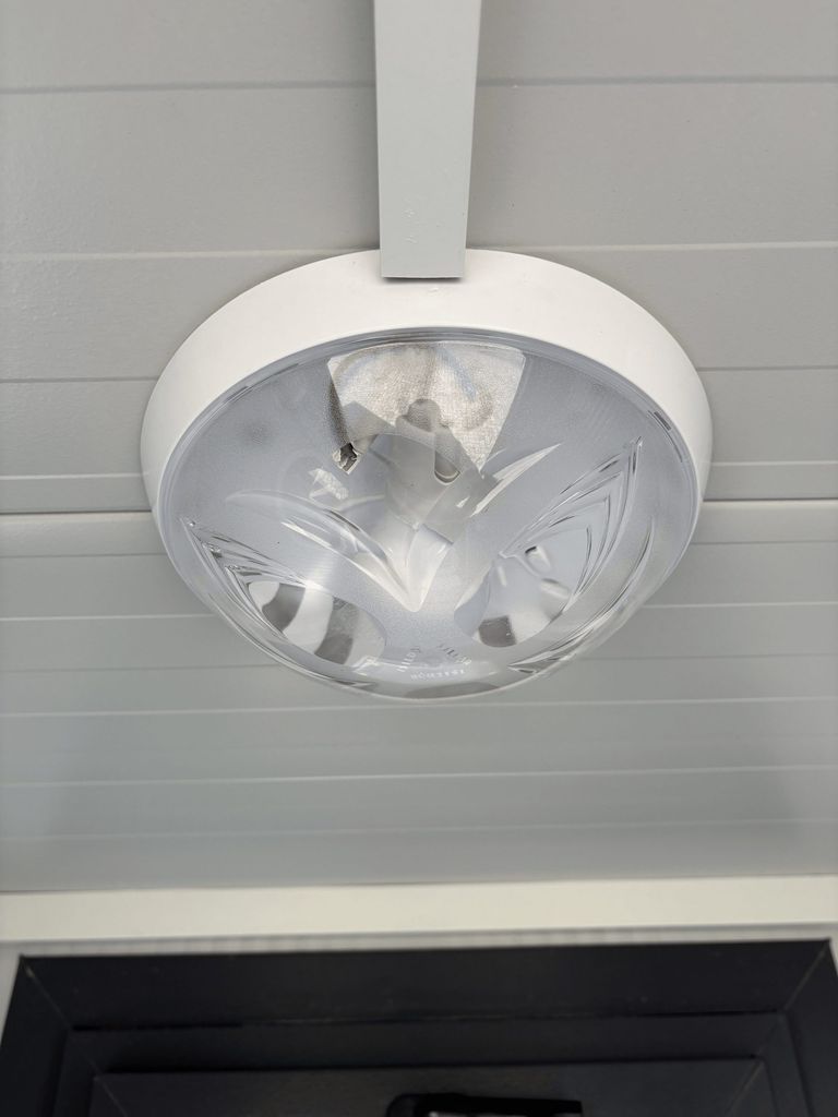 LED lighting inside a portable toilet unit for camping.